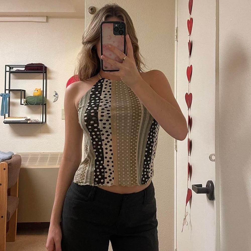 The cream and black polka